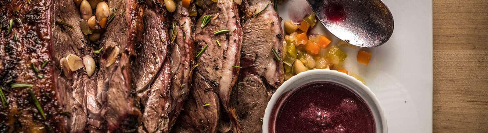 Roasted Leg of Lamb with Red Wine Reduction | Ultra Modern Pool and Patio